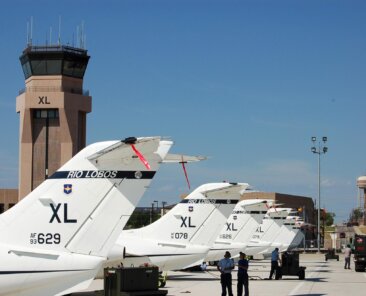 T-1 Jayhawks are parked on the ramp in front of the air traffic control tower at Laughlin Air Force Base, Texas, on June 26, 2006. Laughlin's 47th Flying Training Wing trains Air Force pilots, who fly about 89,000 flying hours a year. (U.S. Air Force photo/Staff Sgt. Jeremy Larlee)